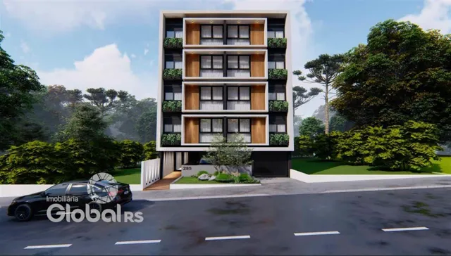 Fachada de um prédio residencial em Lajeado com vegetação ao redor.