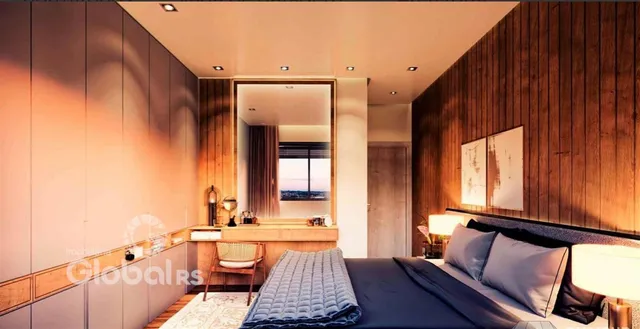Quarto com paredes de madeira e cama grande.