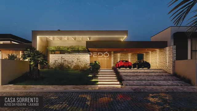 Fachada de uma casa moderna em Lajeado, Brasil, com jardim e entrada.