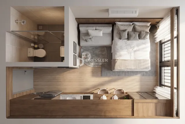 Quarto com cama grande e banheiro adjacente em um imóvel no Brasil.
