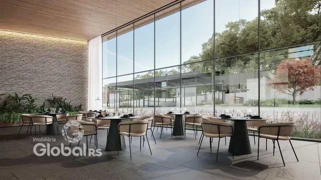 Vista de uma área de jantar moderna com mesas ao ar livre.