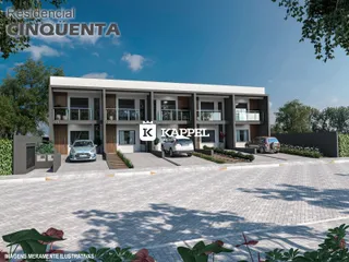 Fachada de uma residência moderna com jardim em Lajeado, Brasil.