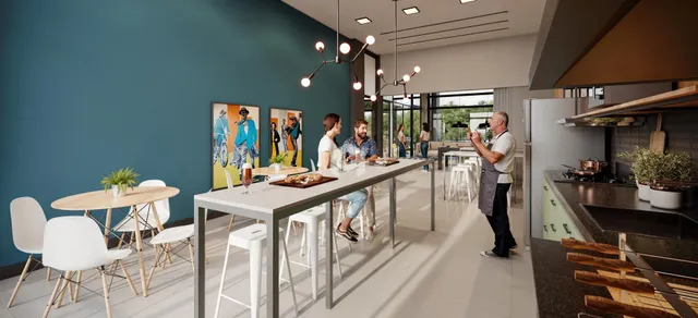 Ambiente moderno de sala de jantar com mesa longa em um imóvel.