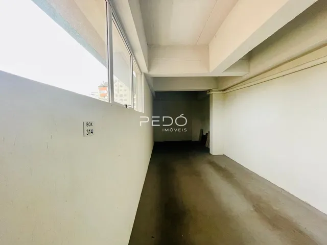 Corredor interno de uma propriedade em Lajeado.