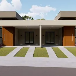 Exterior da casa com área coberta e jardim bem cuidado em Lajeado.