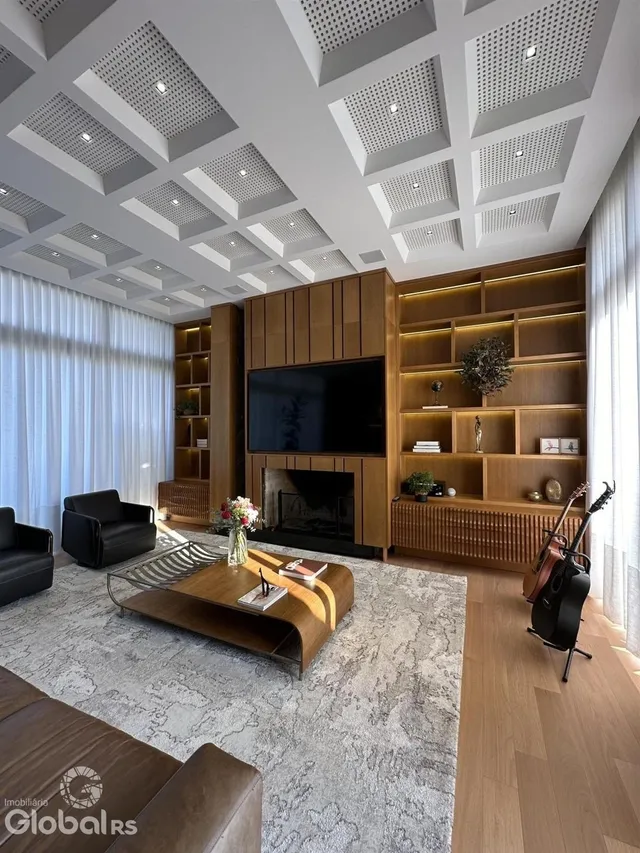 Sala de estar com decoração moderna e painéis de madeira.