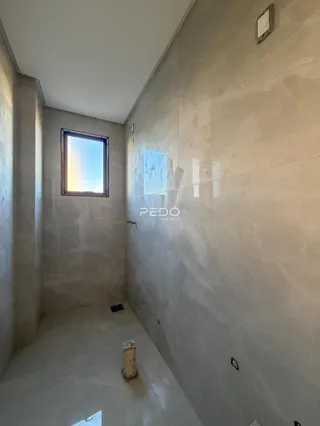Vista de um corredor interno de uma propriedade em Lajeado, Brasil.