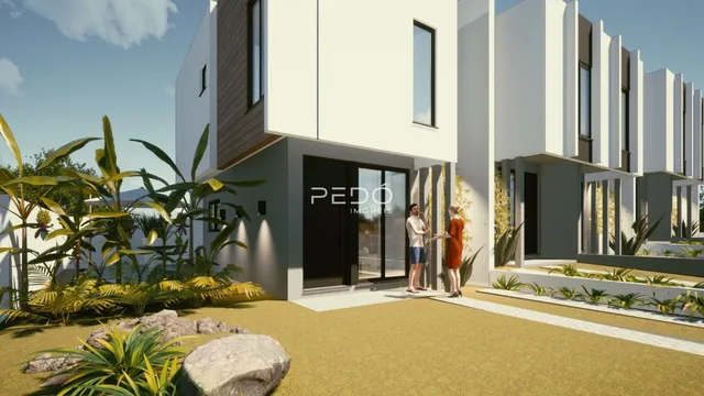 Fachada moderna de uma residência em Lajeado, Brasil, com jardim exuberante.