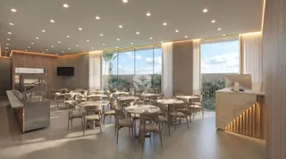 Ambiente interno moderno com grandes janelas de vidro.