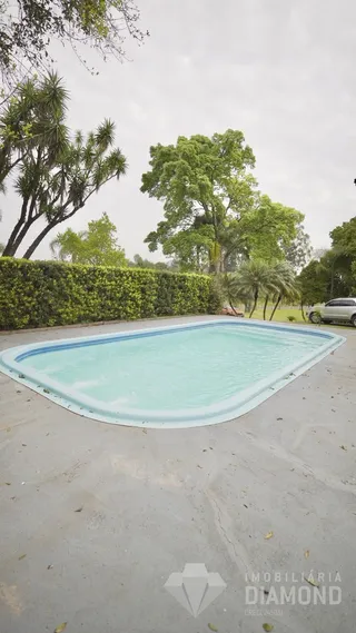 Foto da piscina externa de uma propriedade em Lajeado.