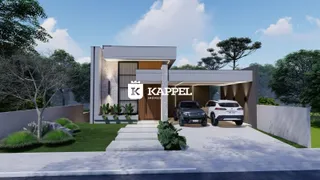 Fachada moderna de uma residência em Lajeado, Brasil, com jardim e garagem.
