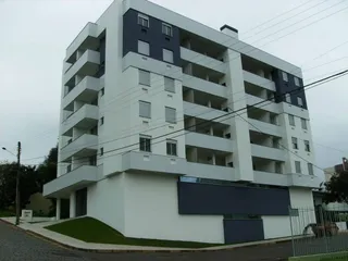 Fachada de um prédio residencial moderno em Lajeado, Brasil.