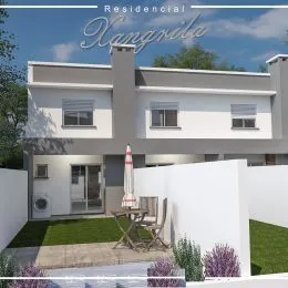 Fachada de uma residência moderna branca em Lajeado, Brasil.