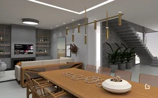 Ambiente interno moderno com escadaria e mesa de madeira.