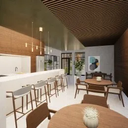 Ambiente interno com painéis de madeira e mesa de jantar em um imóvel.