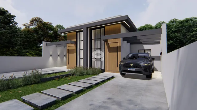 Fachada moderna de uma residência com jardim e entrada de concreto.