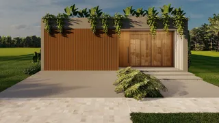 Fachada moderna de uma residência com revestimento de madeira e paisagismo.