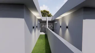 Vista de um corredor entre edifícios modernos.