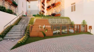 Fachada de casa com escadaria de pedra e jardim cercado por madeira.
