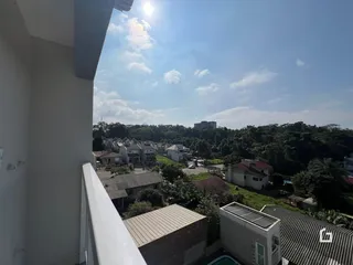 Vista de casas e vegetação na região de Lajeado.