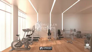 Foto de um ambiente interno com equipamentos de ginástica.