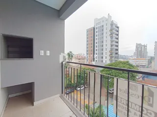 Vista da fachada de um imóvel com varanda em Lajeado, Brasil.