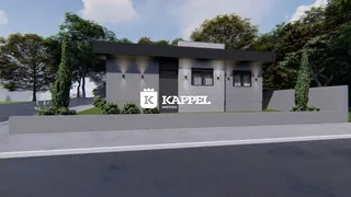 Fachada moderna de uma residência em Lajeado, Brasil, com paisagismo frontal.