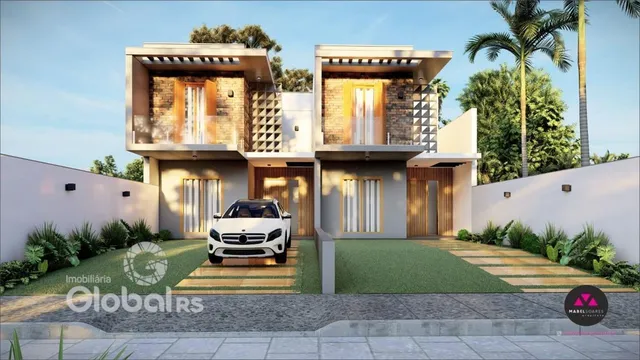 Fachada de uma residência moderna em Lajeado, Brasil, com jardim frontal.
