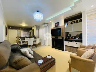 Sala de estar e jantar de um apartamento em Lajeado, Brasil.