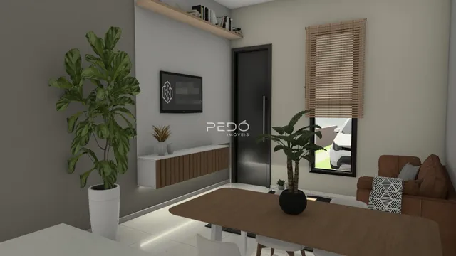 Sala de estar com decoração e janela em um imóvel no Brasil.