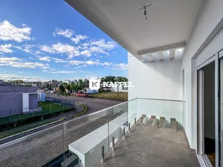 Vista da área externa do imóvel em Lajeado, com vista para a rua e paisagem.