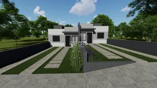 Fachada de uma casa moderna em Lajeado, Brasil, com jardim frontal.