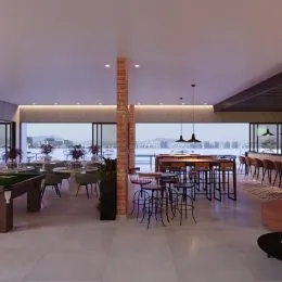 Ambiente de jantar amplo com vista para a paisagem urbana.
