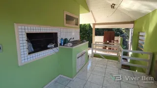 Casa com 4 dormitórios, foto 1