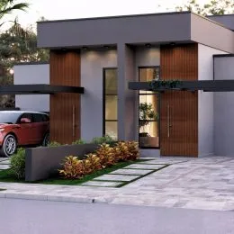 Fachada moderna de uma residência em Lajeado, Brasil com revestimento em madeira.