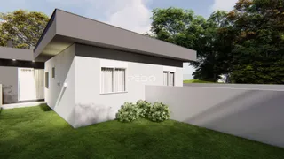 Fachada moderna de uma casa em Lajeado, Brasil, com jardim gramado.