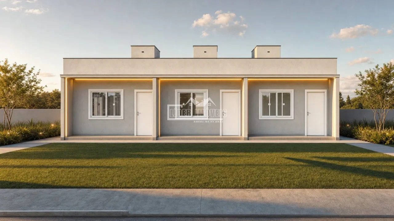 Fachada moderna de uma casa em Lajeado, Brasil, com iluminação externa.