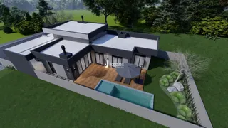Fachada de uma casa moderna com piscina e jardim em Lajeado.