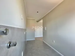 Corredor interno de uma residência em Lajeado.