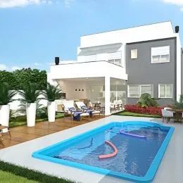 Foto de uma piscina externa em uma propriedade.