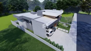 Vista externa de uma casa moderna com jardim e entrada pavimentada em Lajeado, Brasil.