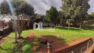 Vista externa do jardim de uma propriedade em Lajeado, Brasil.