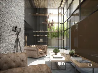 Sala de estar moderna com paredes de tijolo aparente e grandes janelas.
