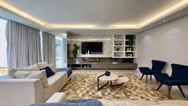Sala de estar moderna com piso em ladrilhos e decoração contemporânea.