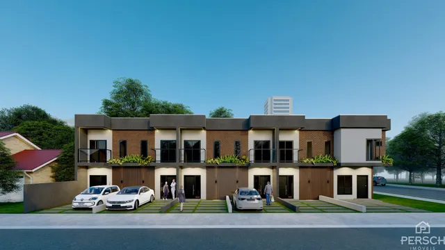 Foto da fachada de uma casa moderna em Lajeado, Brasil, com carros estacionados na frente.