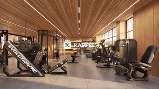 Foto de uma sala de academia com equipamentos de musculação.