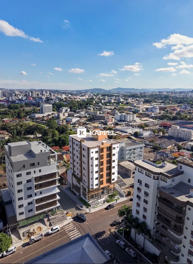 Vista aérea de edifícios residenciais em uma área urbana de Lajeado, Brasil.