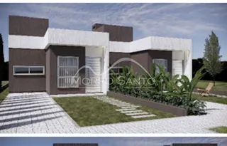 Fachada de uma casa moderna com jardim frontal em Lajeado, Brasil.