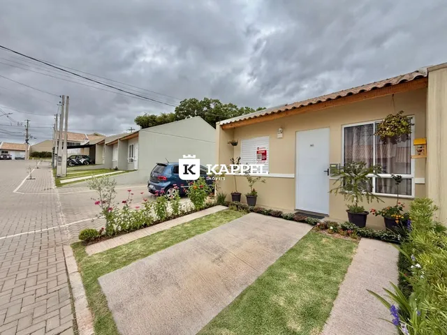 Fachada de uma casa em Lajeado, Brasil, com jardim frontal.