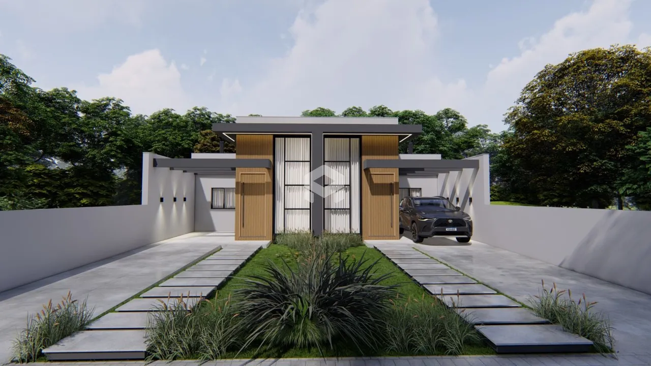 Fachada de uma residência moderna com jardim em Lajeado.